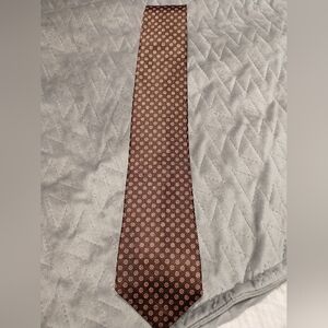 Dino Orsini necktie. Brown with circle print design